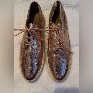 Woman’s Shiny Copper Oxfords